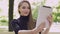 Young smiling woman using tablet for online conversation