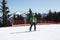 Young snowboard man sliding downhill.