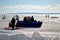 Young snowkiters travel by special air cushion transport over the vast water area of â€‹â€‹the frozen Volga River.