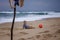 Young soccer player plays barefoot on the ocean shore. Football, sport, passion. Active lifestyle