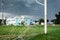 Young soccer player taking goal. Elementary school kids playing football in field.