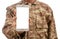 Young soldier showing a mobile phone with blank screen on white background