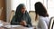 Young Somalian businesswoman shake hands colleague after meeting