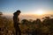 Young southeast asian man standing at mountain