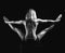 Young sport yoga woman back view posing while doing gymnastic sp