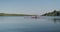 Young sports team two teenage boys with a double boat kayak on the water