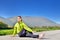 Young sports woman enjoys fitness and bright sunshine