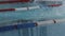 Young sportsman swimmer dives in the water of a training pool