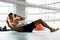 Young sportsman trains obliques muscles