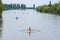 Young sportsmen in a boat, rowing on the river Rioni, Poti, Georgia