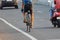 Young sportsmen cycling on modern gear cycle on National Highway in the morning