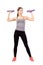 Young sporty blonde woman exercising with aerobic foam dumbbells