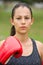 Young sporty confident woman boxing outdoor