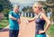 Young sporty couple starting their timer before jogging