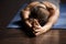 Young sporty woman doing breathing exercise, close up