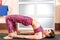 Young sporty woman doing Setu Bandha Sarvangasana