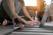 Young sporty woman practicing exercise workout with laptop in room