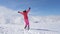 A Young Sporty Woman Runs, Raises Hands And Begins Spinning