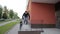 Young street man doing parkour exercise with stairs