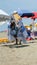 Young Street vendor sells towels on the beach