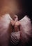 Young strong angel with white wings from heaven. Angel with muscular body. Sensual man