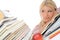 Young student girl with lots of books in panic