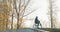 A young student smiles as he sits with bike on a ramp and a helmet