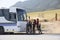 Young students and a school bus South Africa