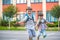 Young students, two sibling brothers, going to school.