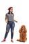 Young stylish girl posing with a red poodle on a leash