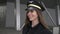 Young Successful Female Airline Captain Pilot Preparing for Flight at Airport