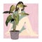 Young summer woman sitting behind a potted house plant