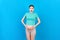 Young surprise or shocked woman pregnant isolated colored background. expression female