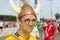 A young Swedish fan wearing a helmet with horns at the World Championships