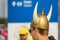 A young Swedish fan wearing a helmet with horns at the World Championships