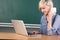 Young Teacher With Laptop At School