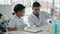 Young teacher and student boy in science class at laboratory