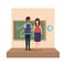 Young teachers couple with chalkboard in classroom scene