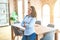 Young team leader business woman standing at the office with crossed arms, proud boss of entrepreneur