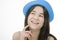 Young teen girl in blue hat, thinking