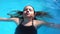 Young Teen Girl in Swimming Pool