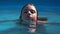 Young Teen Girl in Swimming Pool