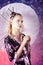 Young teenage girl in floral kimono in studio