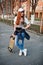 Young teenage urban girl with skateboard