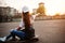 Young teenage urban girl with skateboard