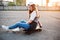 Young teenage urban girl with skateboard