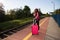 A young teenager from high society, she leaves the provinces on her first vacation trip and waits on the train platform