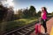 A young teenager from high society, she leaves the provinces on her first vacation trip and waits on the train platform