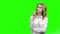 Young thoughtful business woman on green screen.