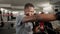 Young tired african male kickboxer during boxing training at gym fight club